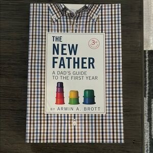 The New Father: A Dad's Guide to the First Year Book